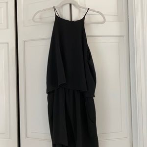Tyche: Black Romper with a high neck